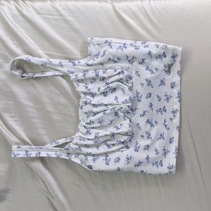 White Hollister crop top with blue flowers